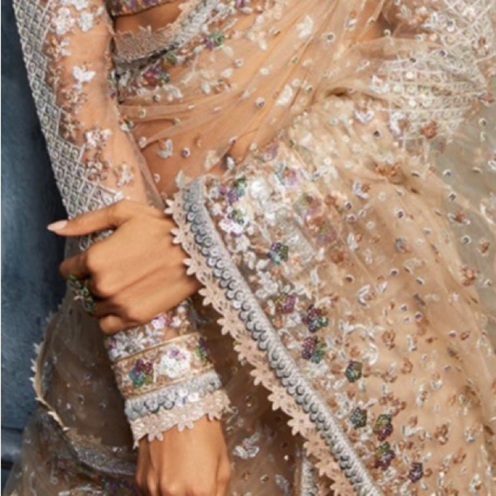 Lashkaraa brand designer wedding saree .